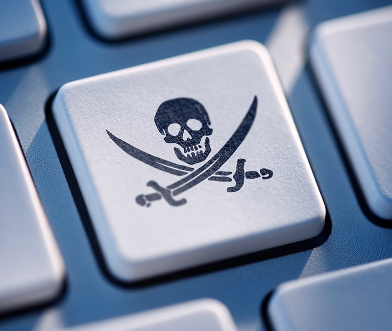 Bouton de clavier avec icône de tête de mort ou de pirate.